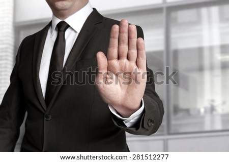 Hand stop shown by businessman. Royalty-Free Stock Photo #281512277