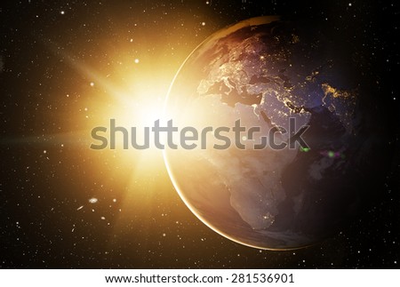 Our earth in cosmos and bright sun. Elements of this image furnished by NASA