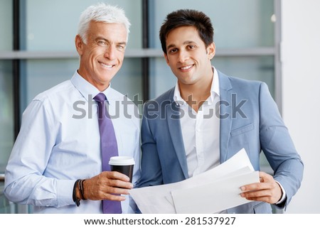 Two businessman in office having discussion