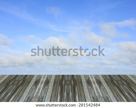 Blue sky and wooden floor background