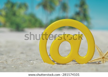 sign at with starfish on the beach. Travel concept 