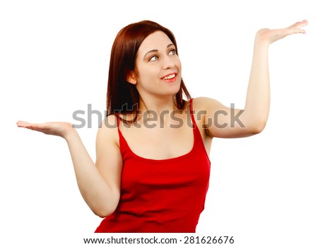 Young woman holding her hands out as if balancing or weighing something isolated on white background