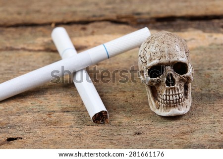 The skull  with a cigarette .