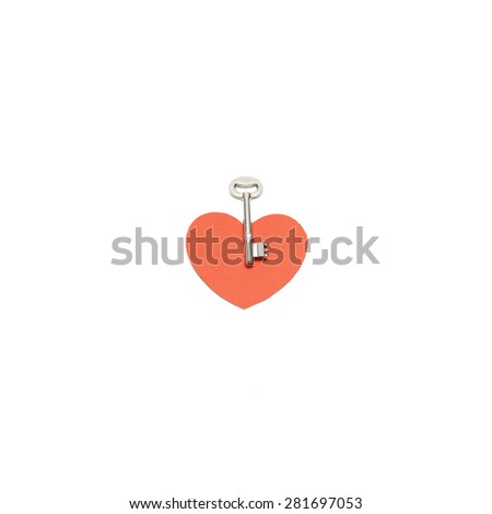 red heart paper with key isolated on white background