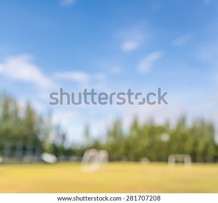 blurred shot of soccer field at school on day time image for background usage.