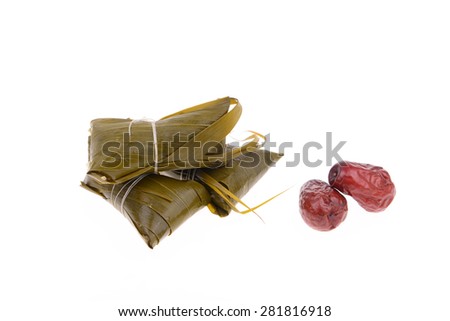 Fresh waxy and red dates on a white background 
