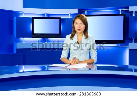 television anchorwoman at studio during live broadcasting Royalty-Free Stock Photo #281865680