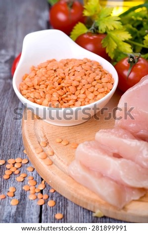 Ingredients for lentil stew with chicken and vegetables