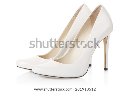 High heel white shoes pair isolated on white, clipping path included  Royalty-Free Stock Photo #281913512