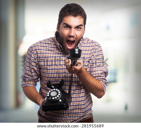 young man shouting telephone