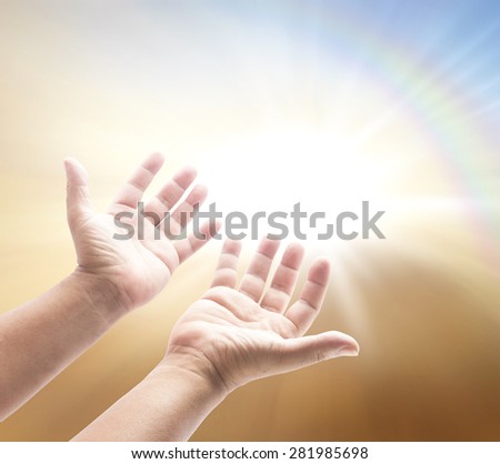 World peace day concept: Jesus christ open empty hands with palms up, over blurred nature background