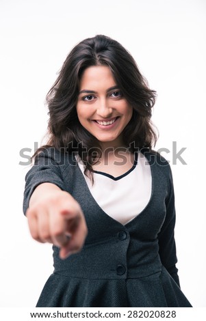 Happy businesswoman pointing finger on camera over white background