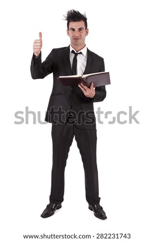 Man suit and book with symbol ok