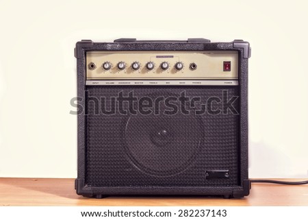 Small electric guitar amplifier Royalty-Free Stock Photo #282237143