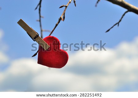 Composite photo - wallpaper with the figure of a heart on a background of blue sky 