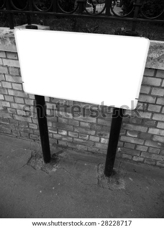 Blank customisable sign in the street.
