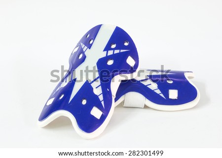 Shinguards is a device used to prevent accidental athlete in competitive soccer Royalty-Free Stock Photo #282301499