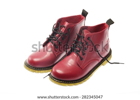 The red leather boots isolated on white background