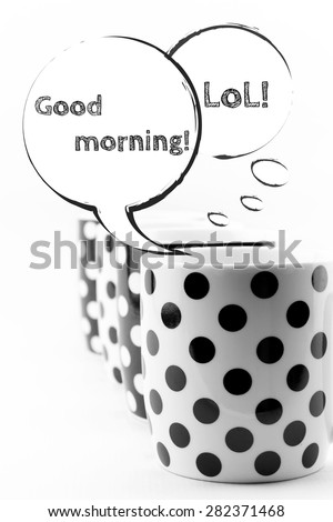 Coffee mugs with speech bubbles isolated on white background