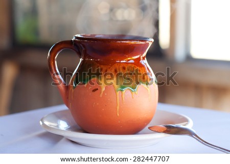 Typical Mexican coffee cup jar barro Royalty-Free Stock Photo #282447707