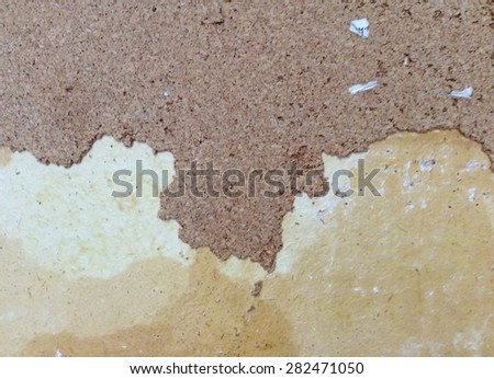 Old peeling paint and dirty on old brown concrete wall background