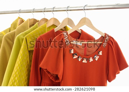 Set of casual female fashion clothing on hangers