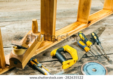 Tools on wooden background