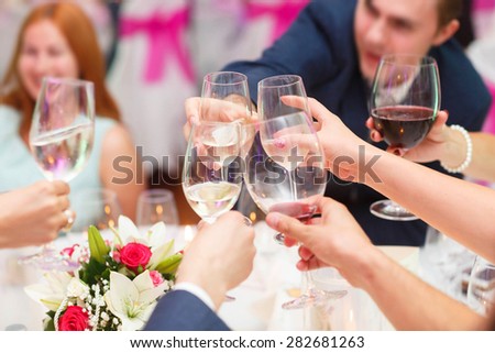 happy gests is celebrating special occasion in the restaurant Royalty-Free Stock Photo #282681263