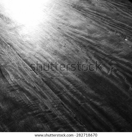 dark wooden background,black and white film filter