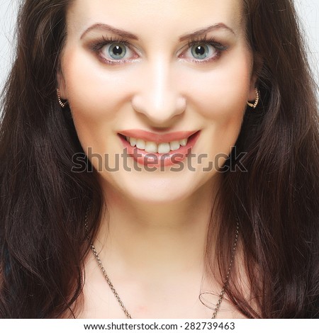 Young beautiful woman with big happy smile