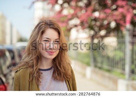 Close up Pretty Blond Girl Walking at the Street, Smiling Into the Distance, Emphasizing Thinking Something Good. Royalty-Free Stock Photo #282764876