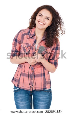 Beautiful girl with microphone isolated on white background