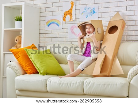 a child plays in the astronaut