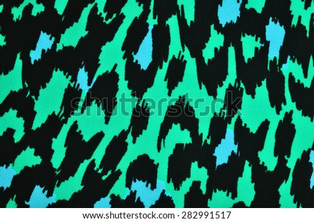 Blue and green leopard pattern. Colorful spotted animal print as background.