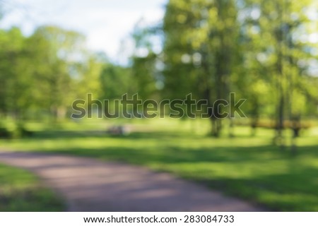 city park alley bokeh background 50mm lens good for backdrops real lens blur Royalty-Free Stock Photo #283084733