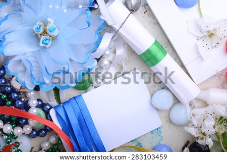 Office table with flower, ribbons, diamonds