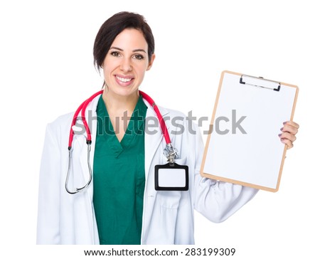 Woman doctor show with blank page of clipboard