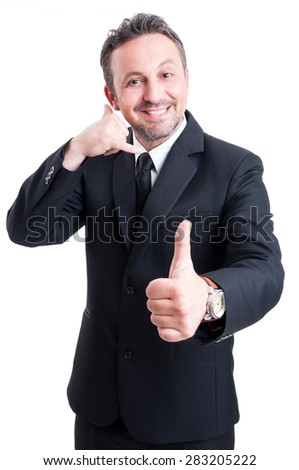 Business man making positive call us and thumb up gesture