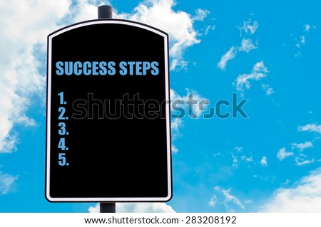 SUCCESS STEPS motivational quote written on road sign isolated over clear blue sky background with available copy space. Concept  image