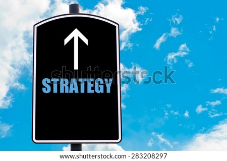 STRATEGY written on road sign isolated over clear blue sky background with available copy space. Motivational Concept  image