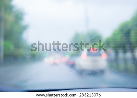 blurred picture of city streets with cars  