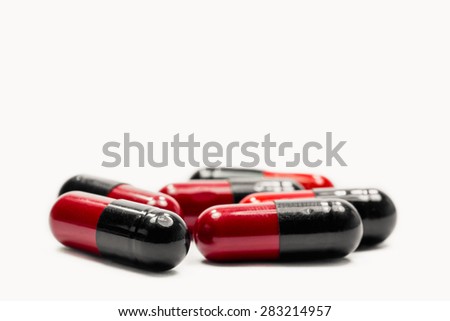 ampicillin capsules on white background
