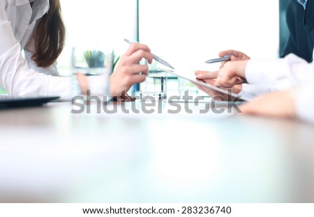 Business adviser analyzing financial figures denoting the progress in the work of the company  Royalty-Free Stock Photo #283236740