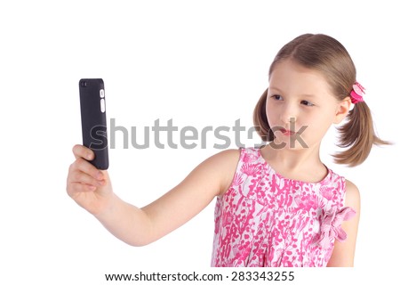 cute little girl making selfie