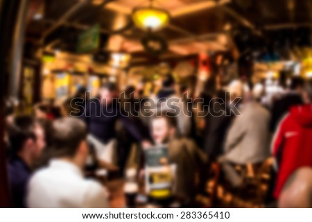 Crowded Irish pub blur Royalty-Free Stock Photo #283365410