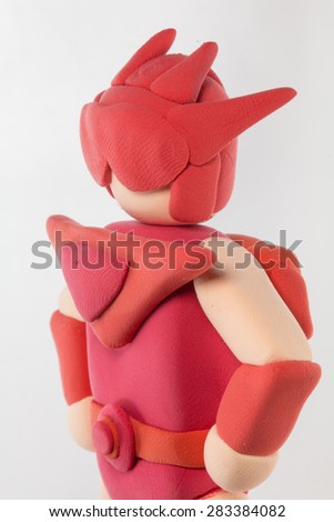 Close up red super hero made from plasticine use for super special protect concept