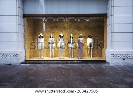 mannequins at shopfront Royalty-Free Stock Photo #283429505