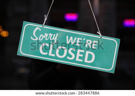 Closed sign. (Sorry we are closed)