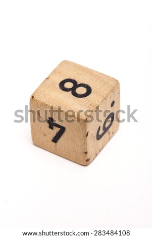 The wooden toy of number(8, 6, 9, 4) dice for kids isolated white background at the studio.