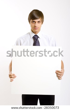 Business man showing a blank board